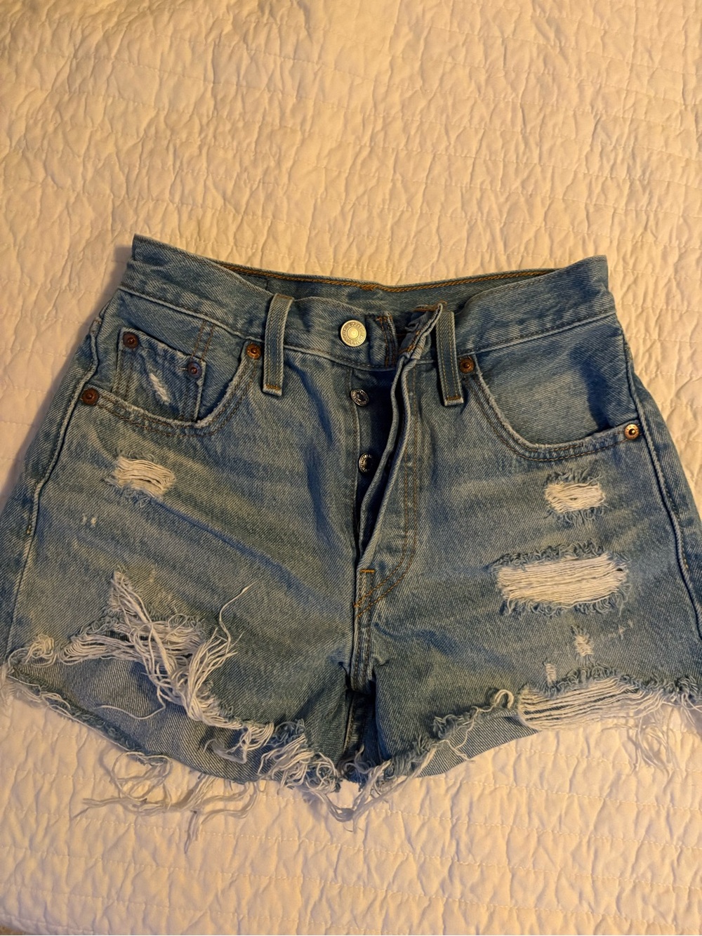 Levi's 501 Light Blue Distressed Denim Shorts